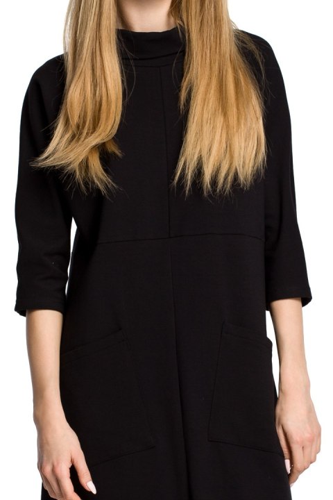 Sukienka dresowa midi oversize z kieszeniami rękaw 3/4 czarna me353 Sukienka dresowa midi oversize z kieszeniami rękaw 3/4 czarna me353
