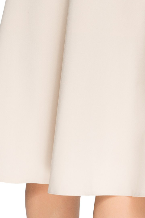 Elegancka spódnica rozkloszowana midi z kontrafałdami beżowa S006 Elegancka spódnica rozkloszowana midi z kontrafałdami beżowa S006