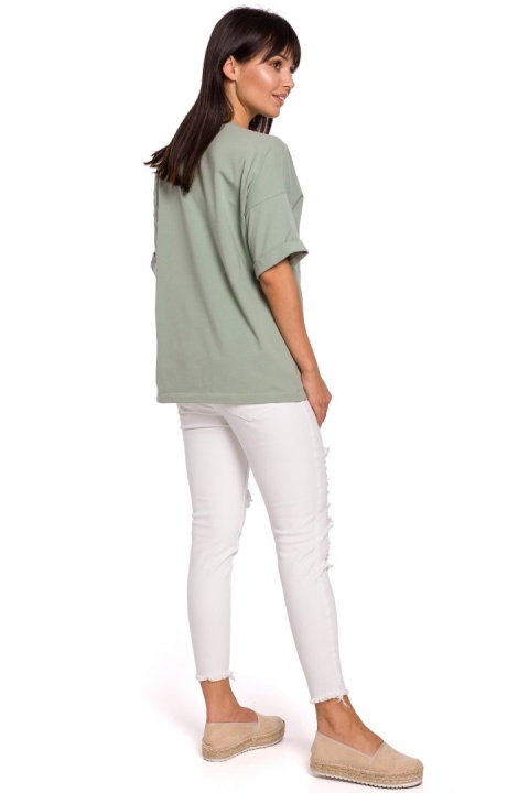 Bluzka damska oversize z głębokim dekoltem krótki rękaw pistacjowa B147 Bluzka damska oversize z głębokim dekoltem krótki rękaw pistacjowa B147