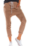 Spodnie damskie dresowe z obniżonym krokiem wiązane beżowe M217