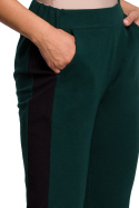 Spodnie damskie dresowe z prostymi nogawkami i lampasami zielone B173