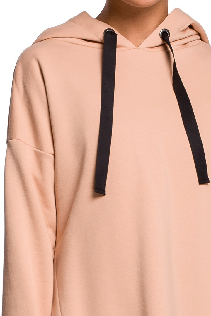 Bluza damska z kapturem i asymetrycznym rozcięciem beżowa B179 Bluza damska z kapturem i asymetrycznym rozcięciem beżowa B179