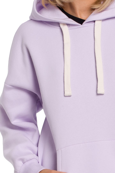 Długa bluza damska oversize z kapturem i kieszenią liliowa me534 Długa bluza damska oversize z kapturem i kieszenią liliowa me534