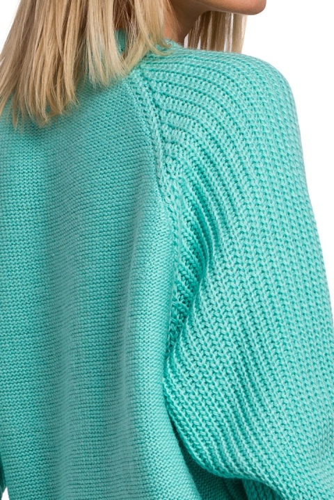 Sweter damski ze splotem warkoczowym okrągły dekolt seledynowy me554 Sweter damski ze splotem warkoczowym okrągły dekolt seledynowy me554