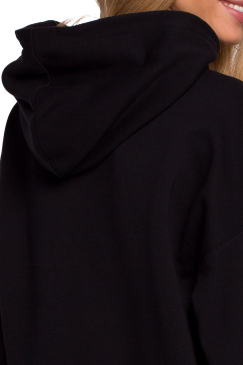 Luźna bluza damska z kapturem i bufiastymi rękawami czarna me588 Luźna bluza damska z kapturem i bufiastymi rękawami czarna me588