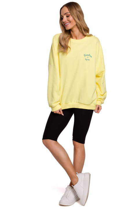 Bluza damska oversize ze ściągaczem i haftem dzianina żółta me587 Bluza damska oversize ze ściągaczem i haftem dzianina żółta me587
