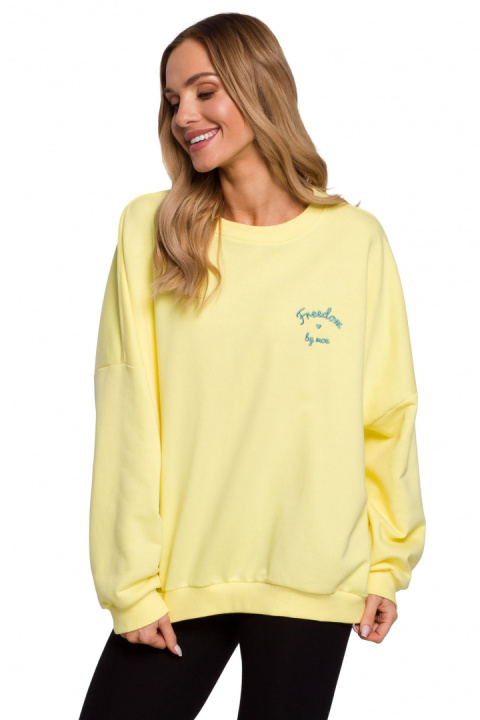 Bluza damska oversize ze ściągaczem i haftem dzianina żółta me587 Bluza damska oversize ze ściągaczem i haftem dzianina żółta me587