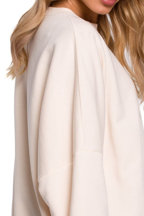 Bluza damska oversize ze ściągaczem i haftem dzianina waniliowa me587 Bluza damska oversize ze ściągaczem i haftem dzianina waniliowa me587