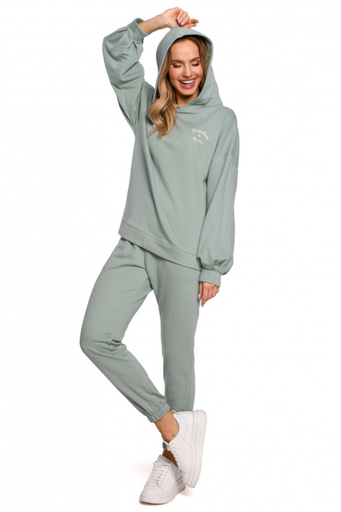Luźna bluza damska z kapturem i bufiastymi rękawami miętowa me588 Luźna bluza damska z kapturem i bufiastymi rękawami miętowa me588