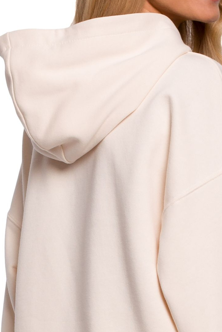 Luźna bluza damska z kapturem i bufiastymi rękawami waniliowa me588 Luźna bluza damska z kapturem i bufiastymi rękawami waniliowa me588