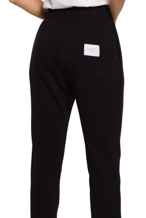Spodnie damskie dresowe joggery z gumką w pasie czarne me585 Spodnie damskie dresowe joggery z gumką w pasie czarne me585