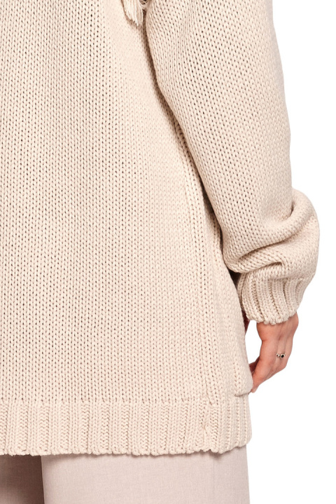 Długi kardigan damski boho z frędzlami bez zapięcia beżowy BK068 Długi kardigan damski boho z frędzlami bez zapięcia beżowy BK068