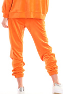 Spodnie damskie dresowe welurowe z gumką w talii pomarańczowe A411