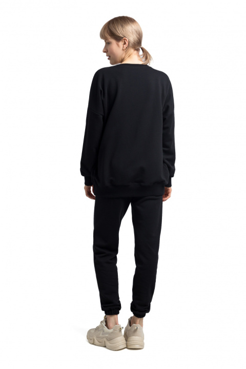 Bluza damska oversize dresowa z dzianiny ze ściągaczem czarna LA057 Bluza damska oversize dresowa z dzianiny ze ściągaczem czarna LA057