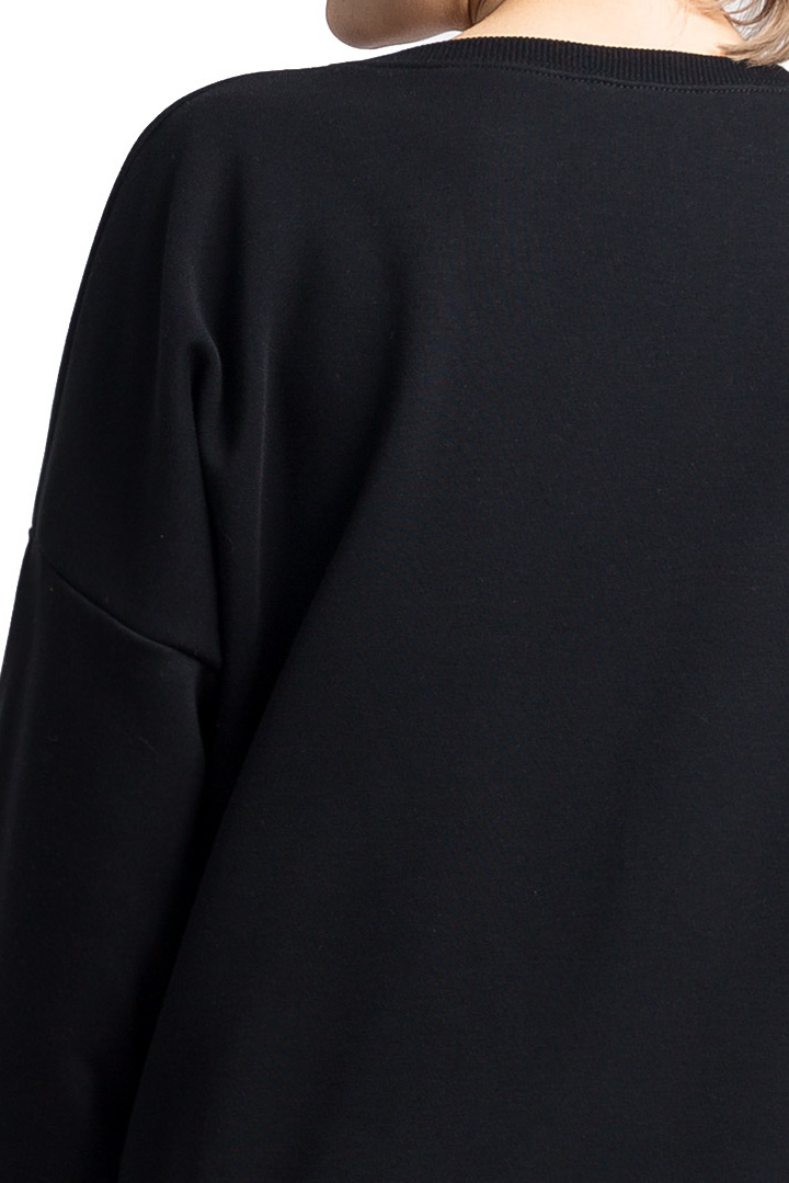 Bluza damska oversize dresowa z dzianiny ze ściągaczem czarna LA057 Bluza damska oversize dresowa z dzianiny ze ściągaczem czarna LA057