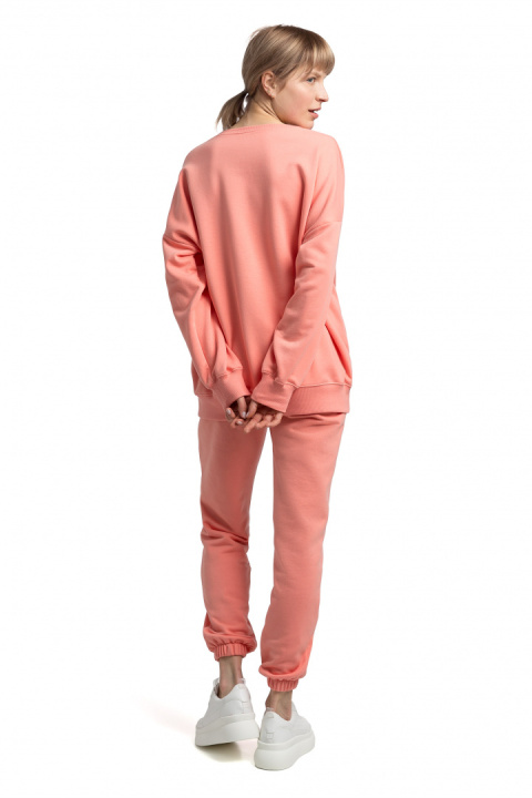 Bluza damska oversize dresowa z dzianiny ze ściągaczem koralowa LA057 Bluza damska oversize dresowa z dzianiny ze ściągaczem koralowa LA057