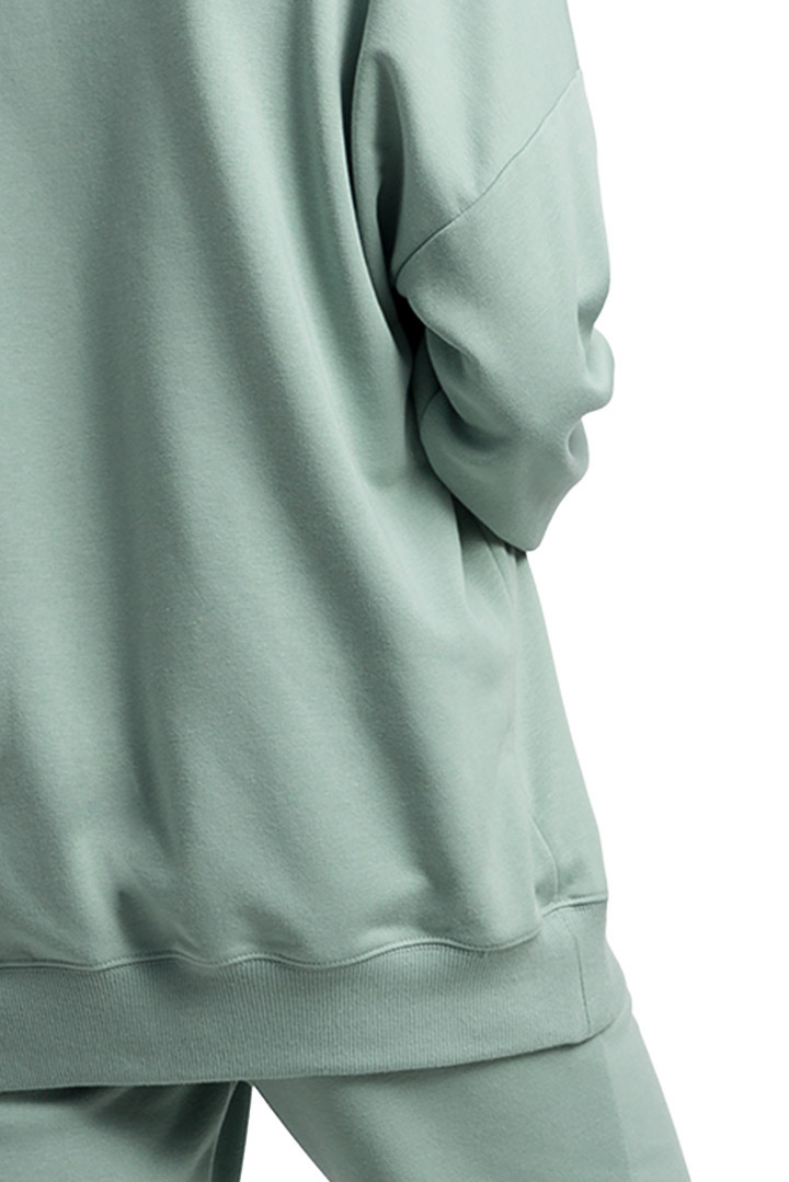 Bluza damska oversize dresowa z dzianiny ze ściągaczem miętowa LA057 Bluza damska oversize dresowa z dzianiny ze ściągaczem miętowa LA057