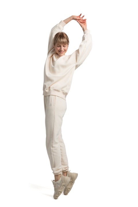 Bluza damska oversize dresowa z dzianiny ze ściągaczem waniliowa LA057 Bluza damska oversize dresowa z dzianiny ze ściągaczem waniliowa LA057