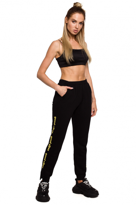 Spodnie damskie joggery dresowe dzianinowe z gumką czarne me621 Spodnie damskie joggery dresowe dzianinowe z gumką czarne me621