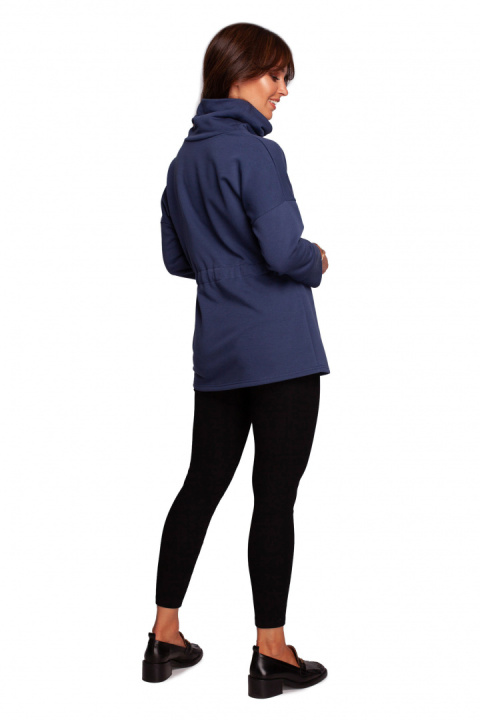 Bluza damska z kołnierzem i tasiemką w centki dzianinowa niebieska B236 Bluza damska z kołnierzem i tasiemką w centki dzianinowa niebieska B236