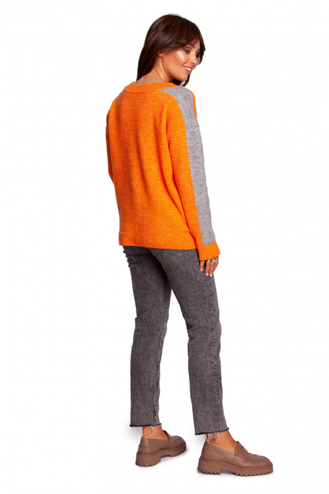 Sweter damski z dekoltem w serek i lampasami pomarańczowy BK093 Sweter damski z dekoltem w serek i lampasami pomarańczowy BK093